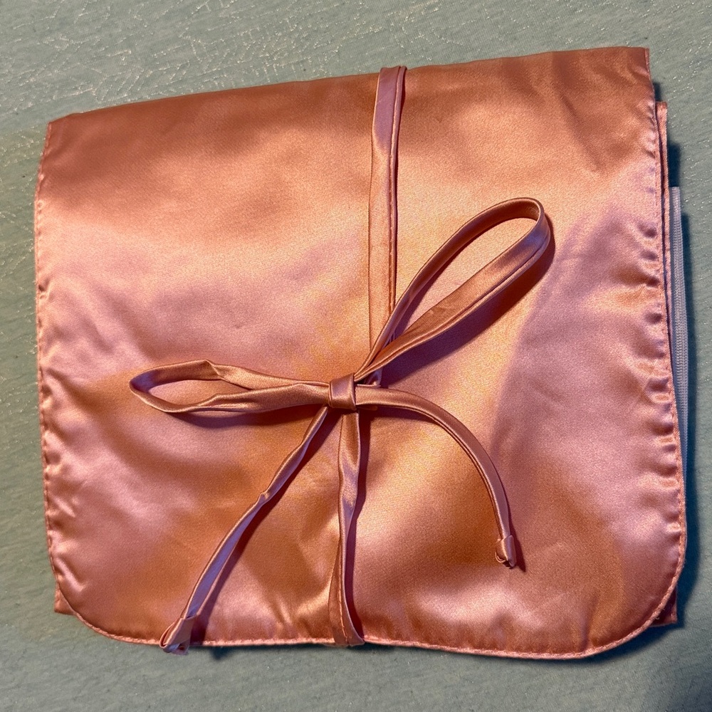 Pink satin 12 compartment travel bag for jewelry, cosmetics or other small items